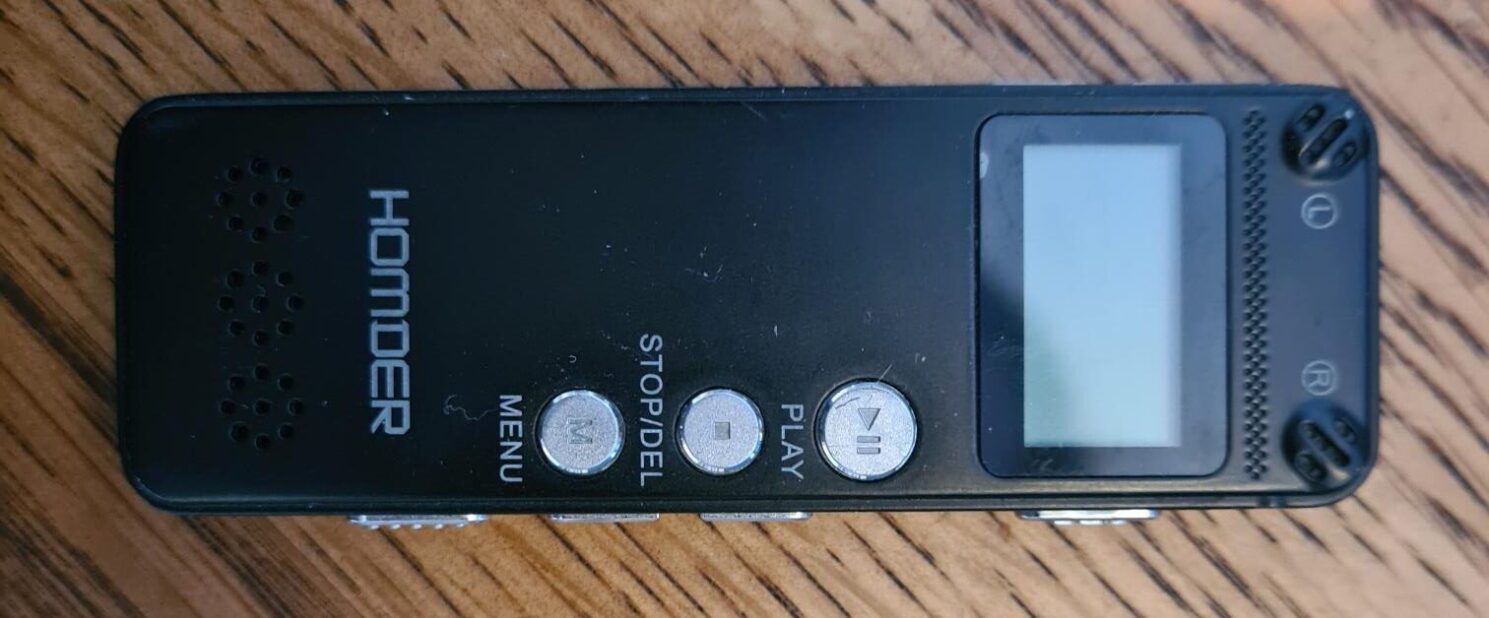 A photo of my Dictaphone on a wooden table